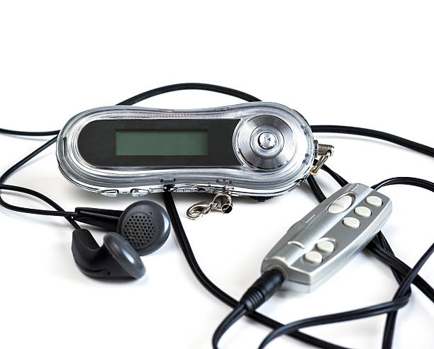 istock portable music player, headphones 523494956