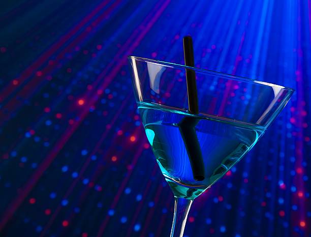 istock blue cocktail drink in a disco 523497410