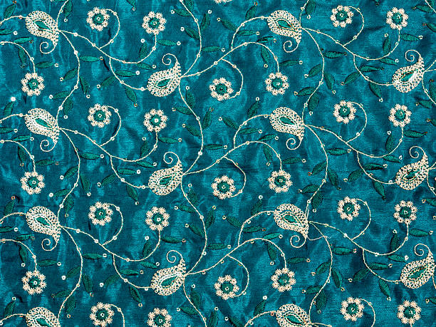 Blue fabric with paisley ornament stock photo