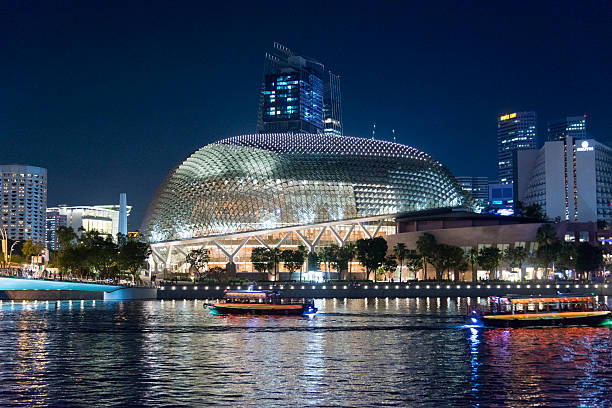 Singapore, Singapore - April 15, 2016: View at the Esplanade Theatres on the Bay during the evening. The Esplanade Theatres is a 60,000 square metres performing arts center located in Marina Bay near the mouth of the Singapore River.