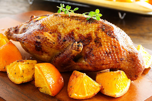 istock Roast duck with pumpkin and oranges. 523509827
