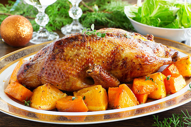 istock Roast duck with pumpkin and oranges. 523510809