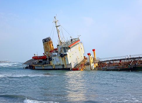 A diesel tanker ship has run aground in shallow waters
