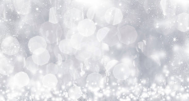istock Abstract silver Christmas background with white snowflakes 523514341