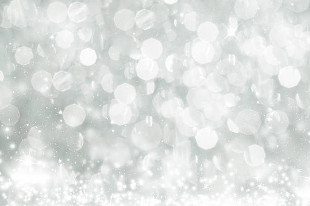 istock Abstract silver Christmas background with white snowflakes 523514359