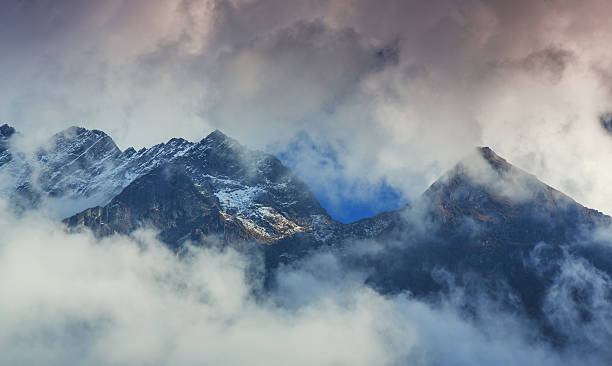 istock Snow covered mountains and rocky peaks 523515053