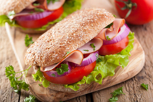 istock sandwich with ham tomato and lettuce 523516481