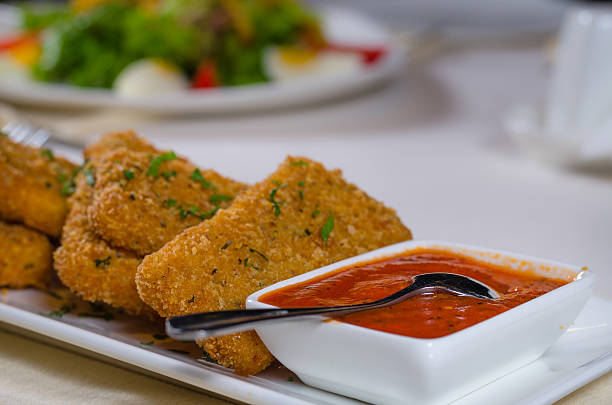 istock Gourmet Appetizing Recipe with Dip Sauce on Table 523517575