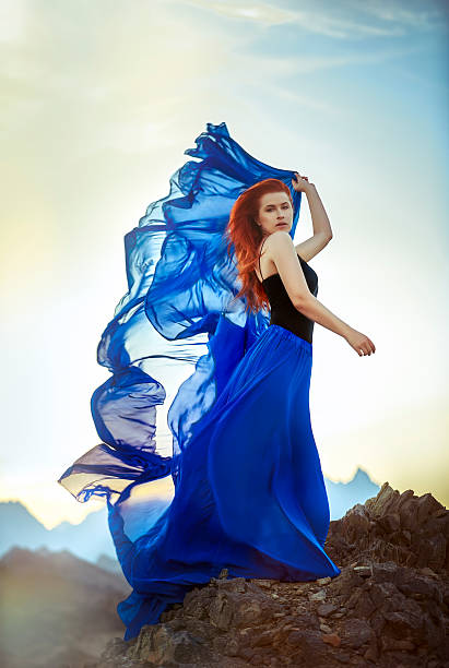 istock with the wind in her dress 523534949