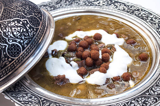 Borani soup with yoghurt in a silver bowl stock photo