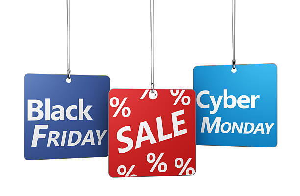 Black Friday And Cyber Monday Sale Black Friday and cyber Monday shopping sale concept with sign and percent symbol on hanged tags isolated on white background. cyber monday stock pictures, royalty-free photos & images