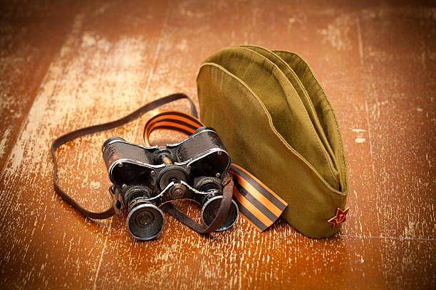 istock Military binoculars, field cap, George Ribbon 523538679