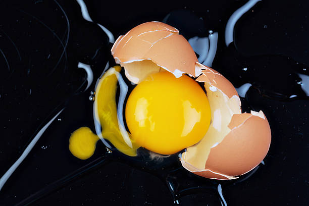 istock Symbolizing all damages and breakages, close-up of broken egg 523539577