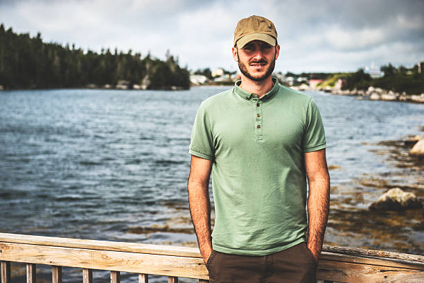 istock cheerful man portrait against the river 523540763