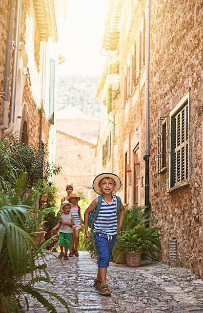 istock Family visiting mediterranean town. 523541287