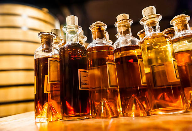montaje de la producción tradicional botella de coñac - cognac bottle fotografías e imágenes de stock