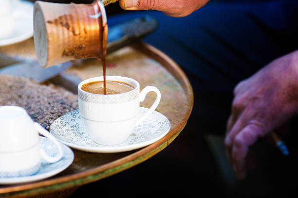 istock Pouring a cup of thick Turkish coffee 523541631