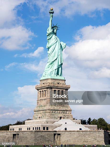 Statue Of Liberty With Skyline Stock Photo - Download Image Now - Blue, Book, Cloud - Sky