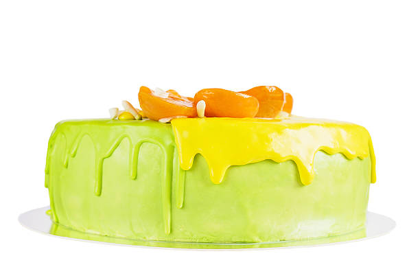 istock Green and yellow glaze cake with apricot 523542779