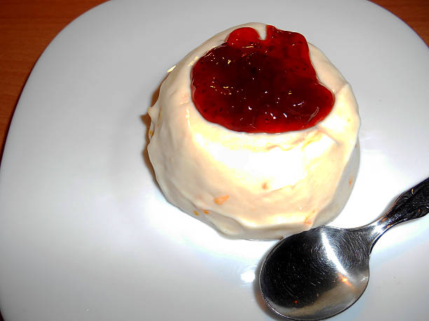istock Yogurt with strawberry jam in white plate 523558799
