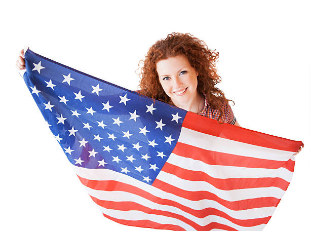 istock Woman with American flag 523558847