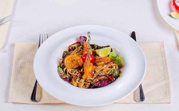 istock Speciality pasta recipe with prawns and vegetables 523558917