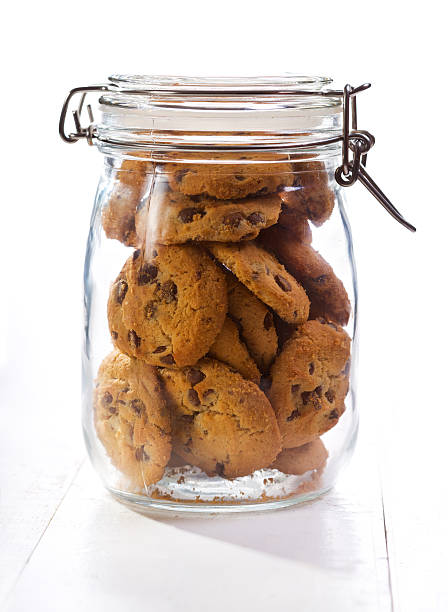 istock Chocolate  cookies in a glass jar 523560537