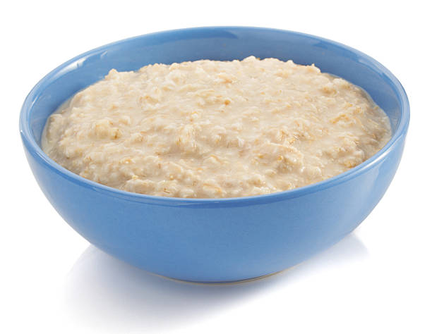 istock bowl of oatmeal  on white 523560561
