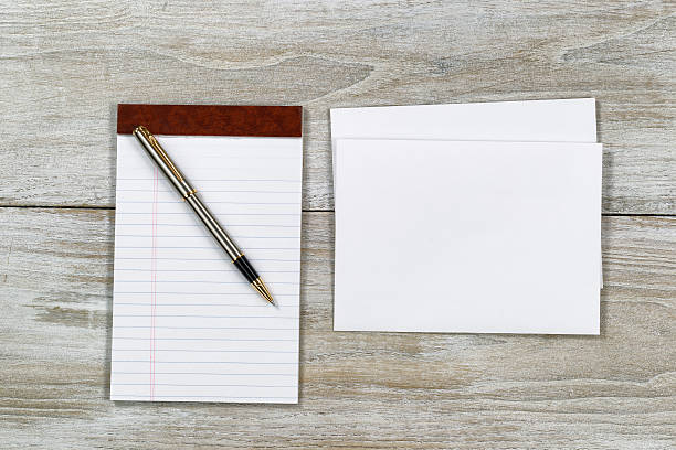 istock Letter Writing Materials on Wooden Desktop 523563569