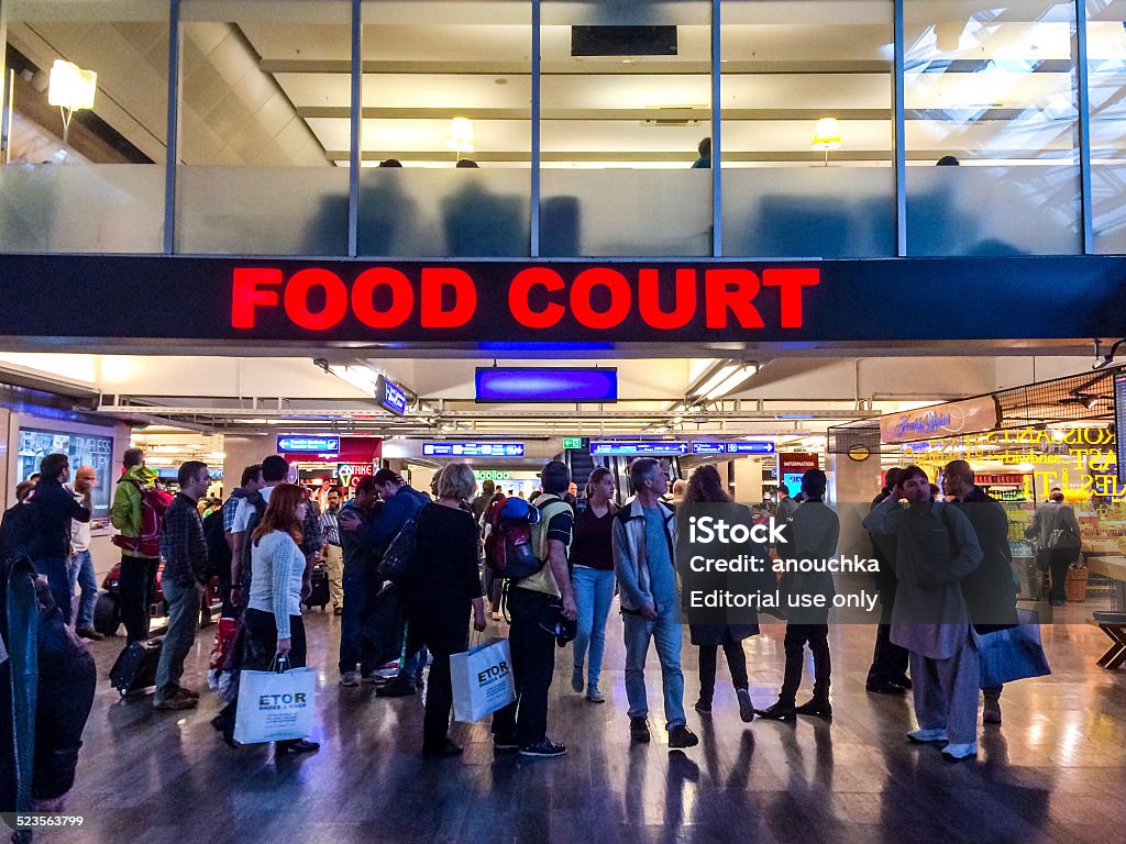 Food court at Ataturk Airport, Istanbul Istanbul, Turkey  - November 1, 2014: Food court at Ataturk Airport, Istanbul. Crowds of people walking through airport. Food Court Stock Photo