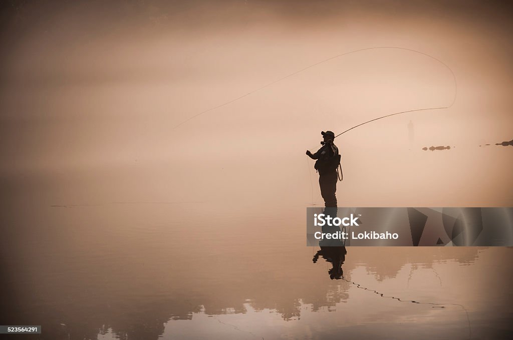 Flyfisherman Silhouette - Lizenzfrei Fliegenfischen Stock-Foto