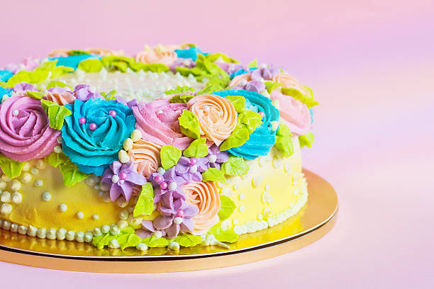 istock Bright colorful cake decorated with cream flowers 523564771