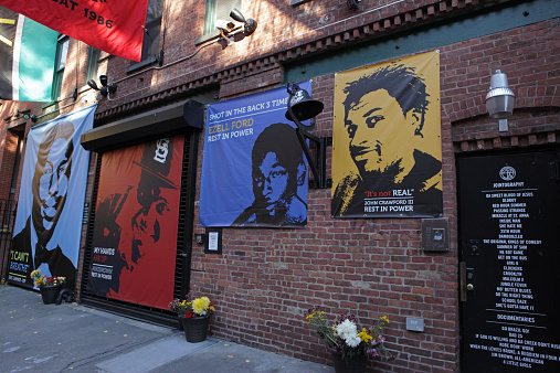 Brooklyn, New York, USA - November 15, 2014: Spike Lee's 40 Acres and a Mule filmworks studio on South Elliott Street in Brooklyn, New York. Posters of African American's killed by police in the United States are exhibited on the outside of the building. The memorial portraits include those of Eric Garner, Ezell Ford, John Crawford III, and