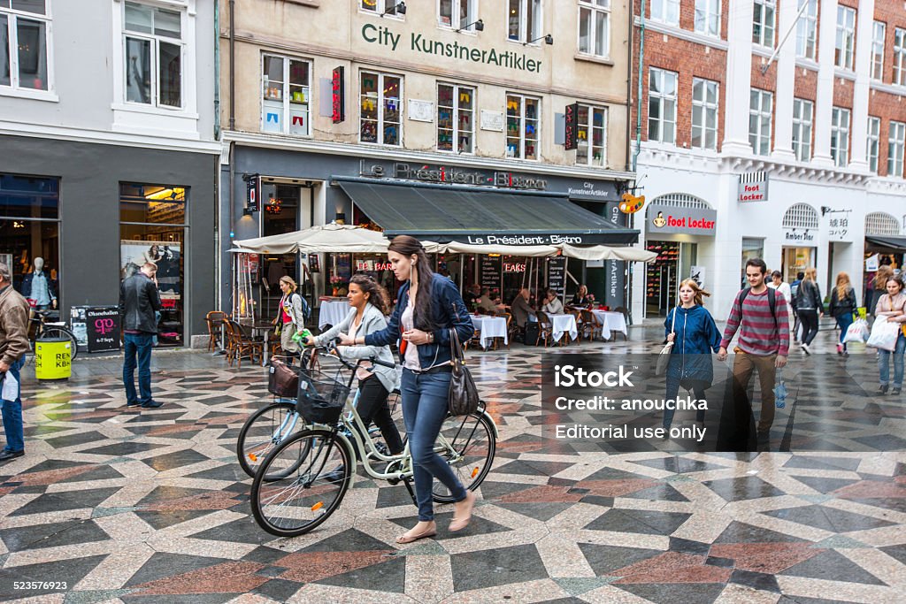 People walking in Copenhagen city center Copenhagen, Denmark - September 10, 2014: People walking in Copenhagen city center, shopping. Copenhagen Stock Photo