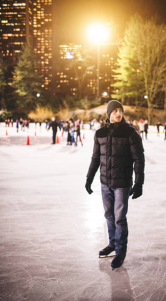 istock Serious man on the Central Park ice rink - winter 523577287