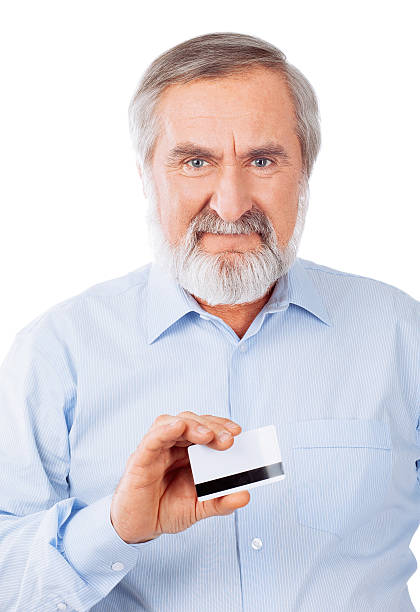 istock Happy old man with a card 523578873
