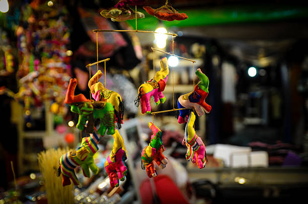 istock puppet in night maket - siem riep - Cambodia 523580211