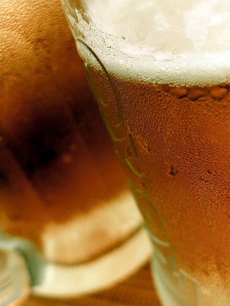 istock Close up of a two beer mugs 523580843
