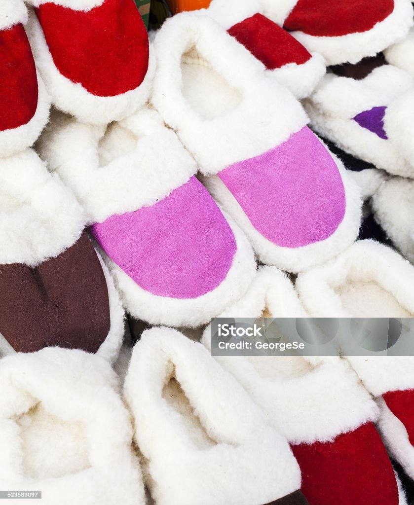 Pile slippers exposed to a fair Brown Stock Photo