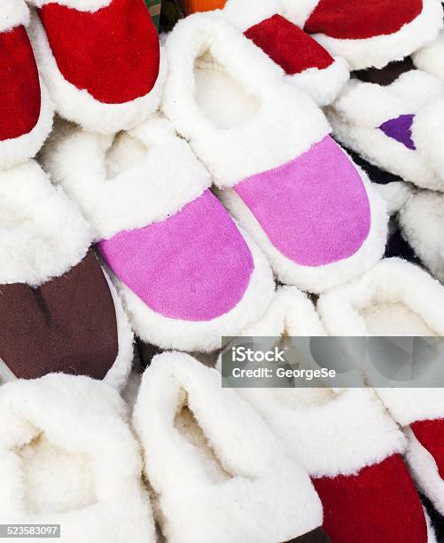 Pile Slippers Exposed To A Fair Stock Photo - Download Image Now - Brown, Clothing, Comfortable