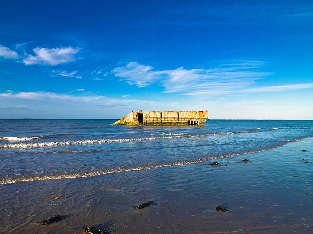istock Remains of the artificial Mulberry Harbour at Arromanches, Franc 523595039