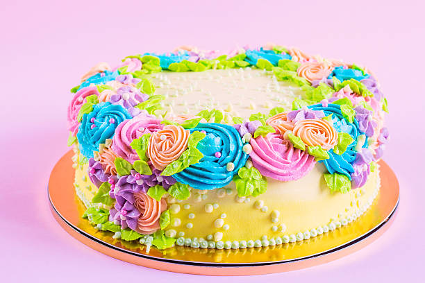 istock Bright colorful cake decorated with cream flowers 523597225
