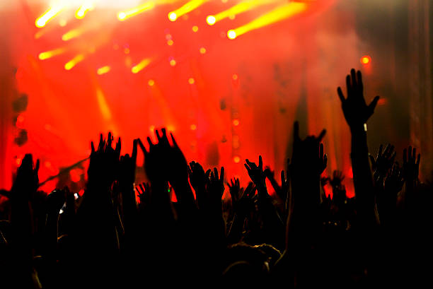istock Silhouette of crowd on concert 523598591