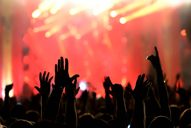istock Silhouette of crowd on concert 523598637
