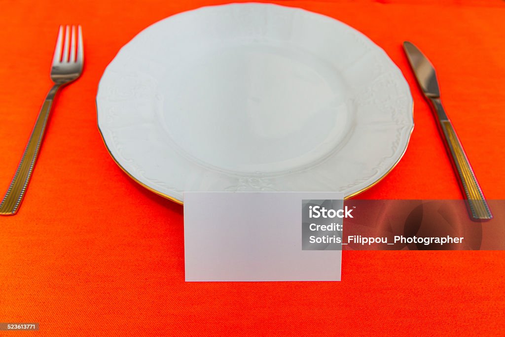 porcelain and dishware Formal Table Setting Closeup with reserved space for additional information Anticipation Stock Photo