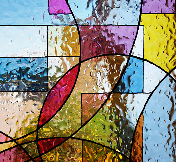 vidriera de colores - stained glass glass art church fotografías e imágenes de stock