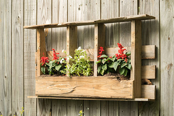 istock Handmade wooden flower basket in backyard 523616272