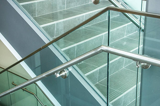 istock Stainless steel handrail in stairwell 523616721