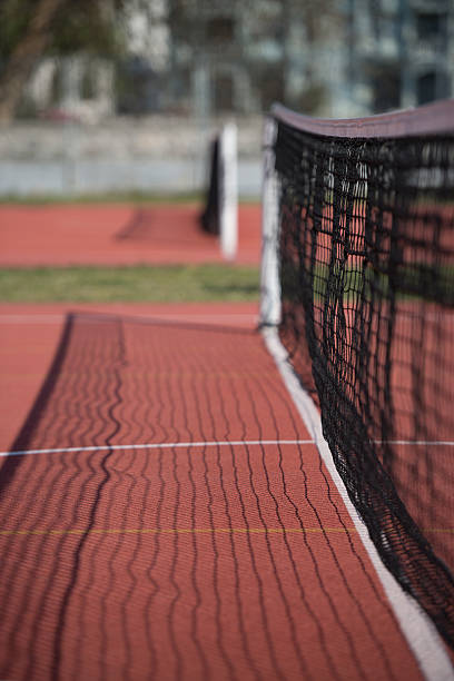 istock Tennis Court Net and Court Beyond 523620083
