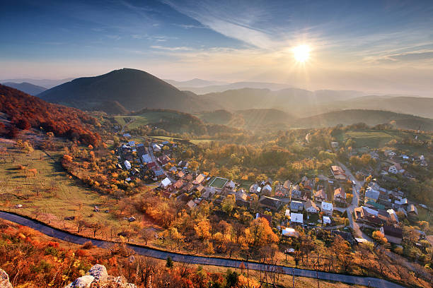 istock Village at autumn with sun 523620870
